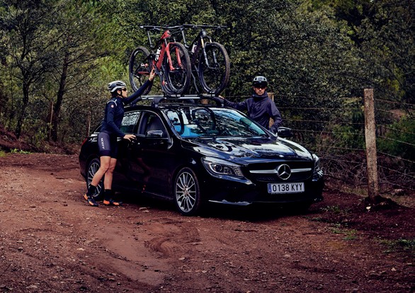 Race Dark in action — cyclists loading bikes