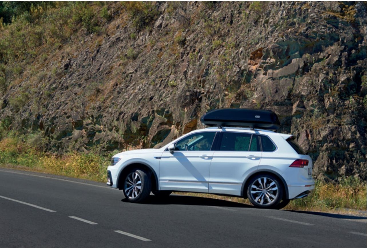 CRUZ Box on the road — white SUV