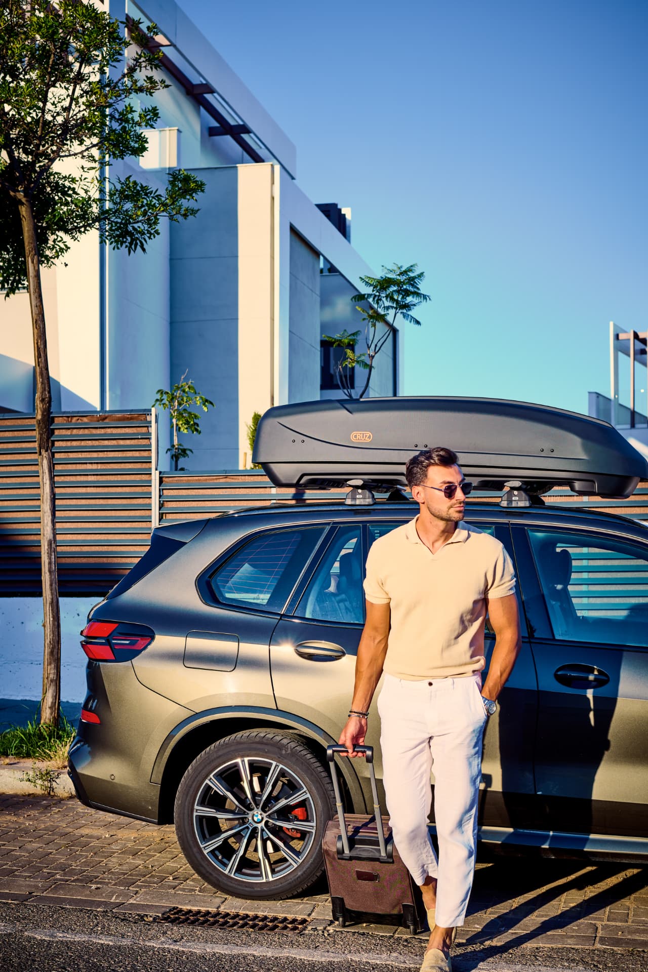 Ready to travel — luggage alongside the vehicle
